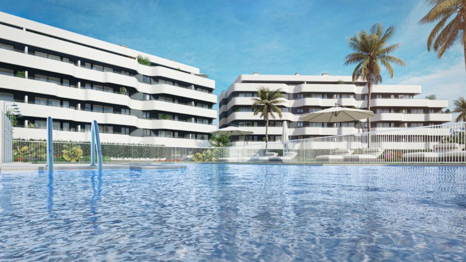 Habitat Alborán exterieur met zwembad en appartementen.